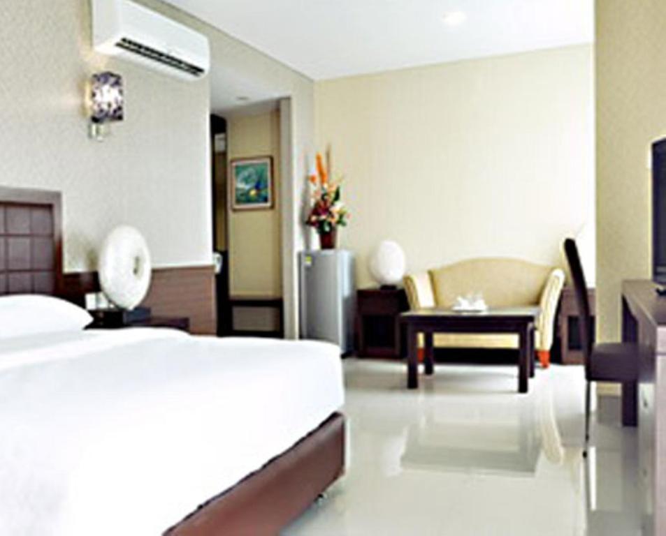 Bamboo Inn Hotel & Cafe Джакарта Номер фото
