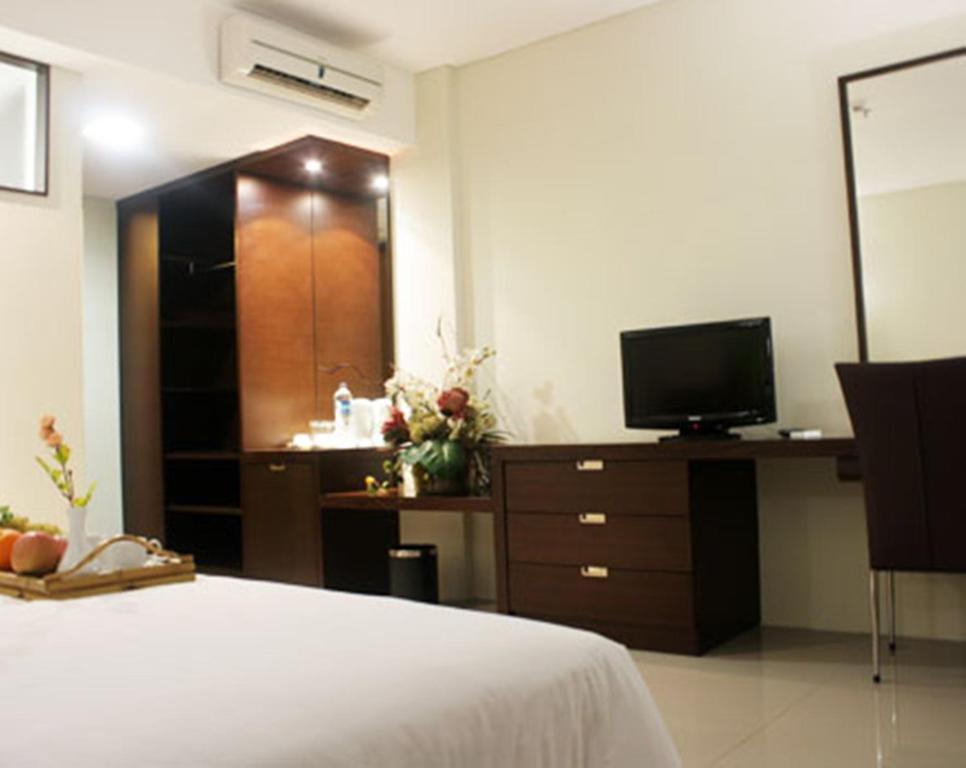 Bamboo Inn Hotel & Cafe Джакарта Номер фото