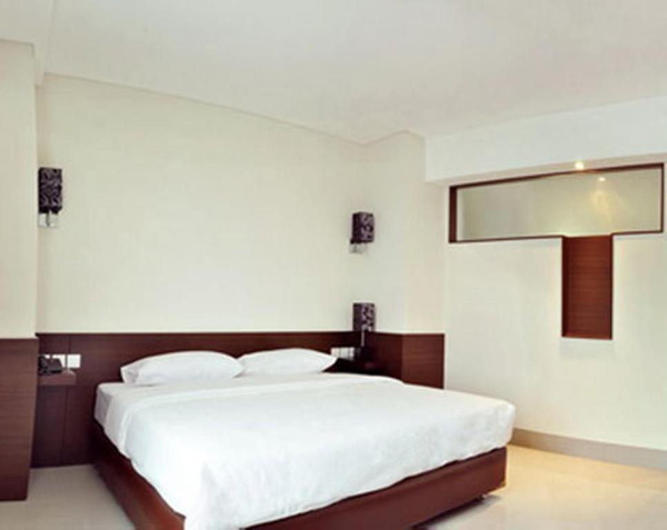 Bamboo Inn Hotel & Cafe Джакарта Номер фото