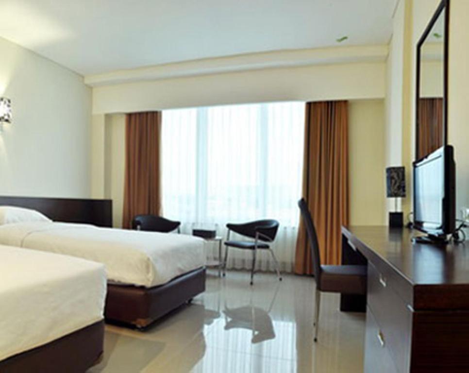 Bamboo Inn Hotel & Cafe Джакарта Номер фото