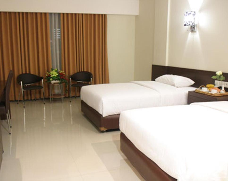 Bamboo Inn Hotel & Cafe Джакарта Номер фото